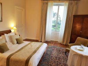 Letto o letti in una camera di Manoir de Kergrec'h