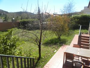 En balkon eller terrasse på El Jardin de los Gatos Apartament