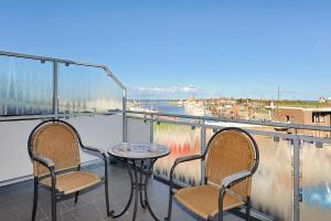 Balkón nebo terasa v ubytování Residenz am Hafen