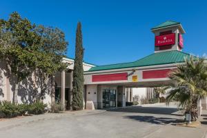 a front view of a mobil gas station at Ramada by Wyndham Odessa Near University of Texas Permian in Odessa