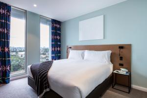Letto o letti in una camera di Citadines Connect Sydney Airport