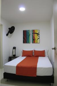 Ένα ή περισσότερα κρεβάτια σε δωμάτιο στο Hotel Pereira 421