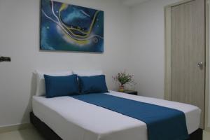 Ένα ή περισσότερα κρεβάτια σε δωμάτιο στο Hotel Pereira 421