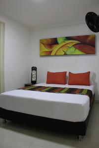 Ένα ή περισσότερα κρεβάτια σε δωμάτιο στο Hotel Pereira 421