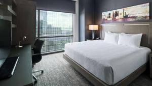 Postel nebo postele na pokoji v ubytování Hyatt House Jersey City + 37 fotografií