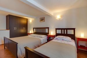 Postel nebo postele na pokoji v ubytování House Medea