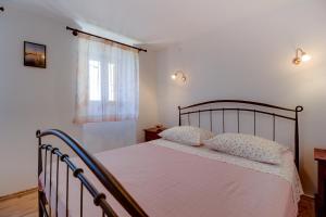 Postel nebo postele na pokoji v ubytování House Medea
