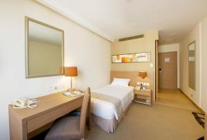 Letto o letti in una camera di The Salisbury - YMCA of Hong Kong