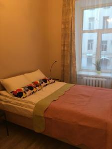 Кровать или кровати в номере МК Отель Краски