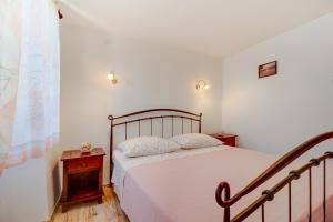 Postel nebo postele na pokoji v ubytování House Medea