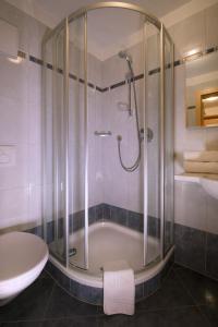 Ванная комната в Appartamenti Villa Olympia