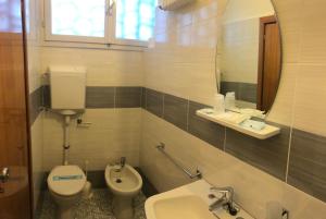 Koupelna v ubytování Hotel Wega