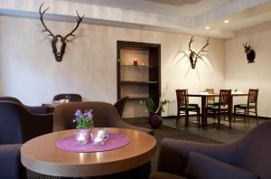 Posezení v ubytování AKTIVHOTEL Weisser Hirsch