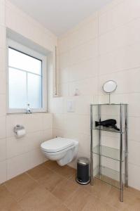 Koupelna v ubytování Ferienwohnung Seeperle + 25 fotografií