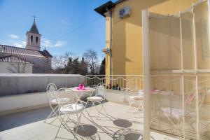 Balkón nebo terasa v ubytování Shabby Chic Apartments