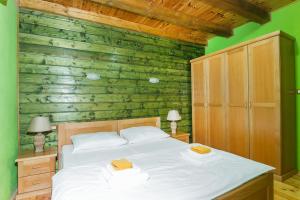 Letto o letti in una camera di Hotel & Resort Gacka