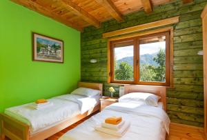 Ένα ή περισσότερα κρεβάτια σε δωμάτιο στο Hotel & Resort Gacka