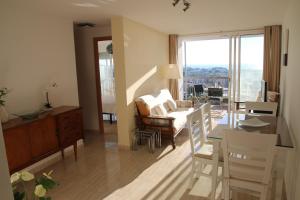 Posedenie v ubytovaní Apartamento La Torre