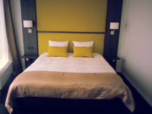 Letto o letti in una camera di Hotel Medemblik