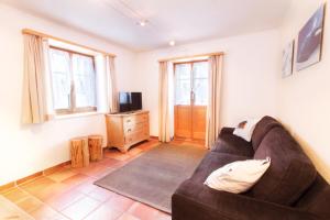 TV a/nebo společenská místnost v ubytování Apartment Dorfblick
