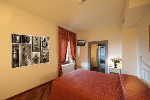 Postel nebo postele na pokoji v ubytování Hotel Villa San Michele