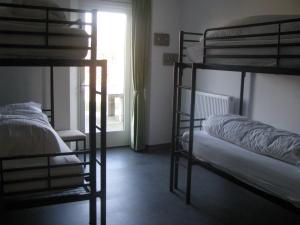 Postel nebo postele na pokoji v ubytování B&B bij de 3 linden