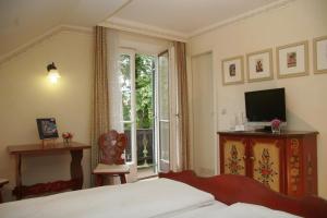TV/trung tâm giải trí tại Landhotel Herzogstand Garni