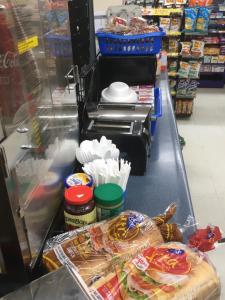a counter with a variety of food items on it at Fundy Spray Motel in Middleton