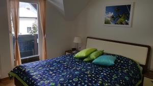 Postel nebo postele na pokoji v ubytování Apartma Ravbar