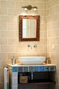 a bathroom with a sink and a mirror at B&B La Scalinatella in Rome