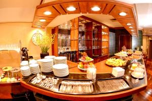 Reštaurácia alebo iné gastronomické zariadenie v ubytovaní Hotel Cantelle