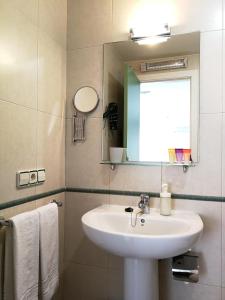 Vonios kambarys apgyvendinimo įstaigoje Hotel Apartamentos Aralso
