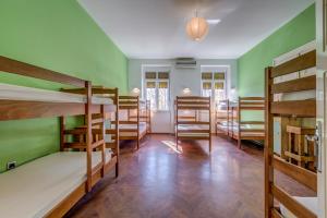 a room with a bunch of bunk beds at Adriatic Hostel - Youth Only in Split