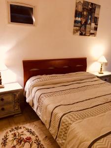 Postel nebo postele na pokoji v ubytování La casa di Nataly