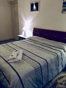 Postel nebo postele na pokoji v ubytování La casa di Nataly
