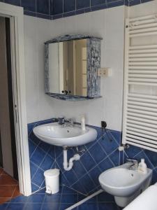 Ванна кімната в Il Pozzo e il Melograno