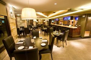 Um restaurante ou outro lugar para comer em Imago Hotel & Spa