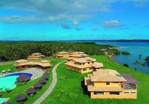 an aerial view of a resort with a pool at Lagoa Eco Village in Pipa