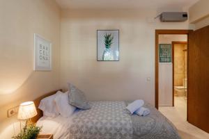 Postel nebo postele na pokoji v ubytování Sitges Holiday Apartment