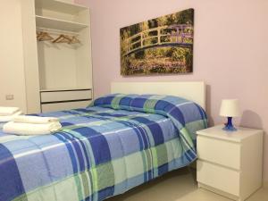 Katil atau katil-katil dalam bilik di Oasi Santa Lucia