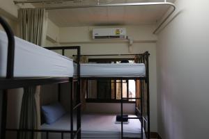 Postel nebo postele na pokoji v ubytování Baan Kamala Backpacker