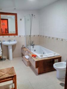 Kúpeľňa v ubytovaní Casa Rural Os Carballos