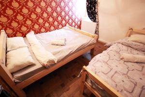 Katil atau katil-katil dalam bilik di Sheni Hostel