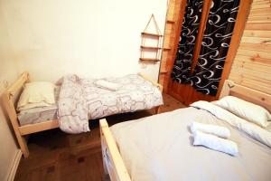 Katil atau katil-katil dalam bilik di Sheni Hostel