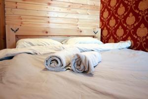 Katil atau katil-katil dalam bilik di Sheni Hostel