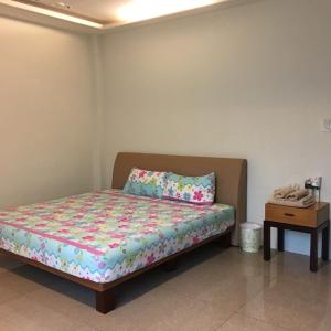 Una cama o camas en una habitación de Ga Chi Lai Homestay
