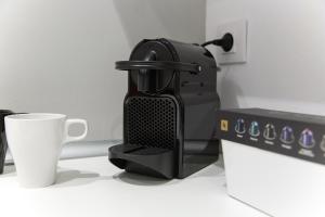 Comodidades para preparar café e chá em Fira Basic