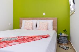 Postel nebo postele na pokoji v ubytování Summer Breeze Villa