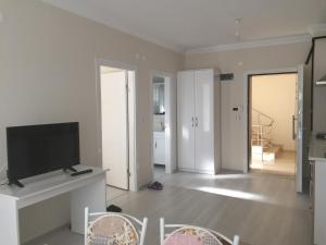 Et tv og/eller underholdning på Dr Aslan Apart Hotel