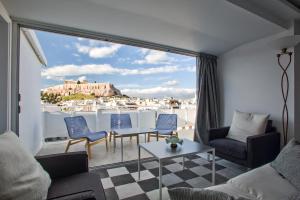 Posedenie v ubytovaní Bright Apartment with Stunning Acropolis Views! SG5